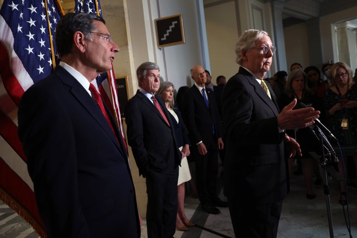 Senate Minority Leader Mitch McConnell (R-Ky.), joined by fellow Senate Republicans, speaking Tuesday. He has said GOP senators are "undecided" on forming a commission to investigate the Capitol riot earlier this year.