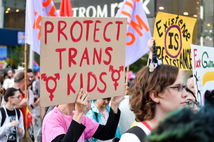 People march through the streets of Toronto during Pride Month. 