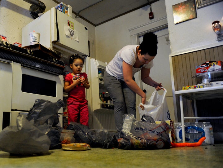 Outside organizations are urging states to share data with the IRS to ensure people who may not file federal taxes but are on programs like SNAP, or food stamps, can get the child tax credit. (Photo by Michael S. Williamson/The Washington Post via Getty Images