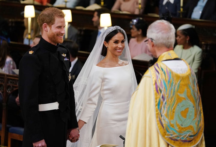 Prince Harry and Meghan Markle during their wedding service, conducted by the Archbishop of Canterbury Justin Welby in St George's Chapel at Windsor Castle on May 19, 2018.