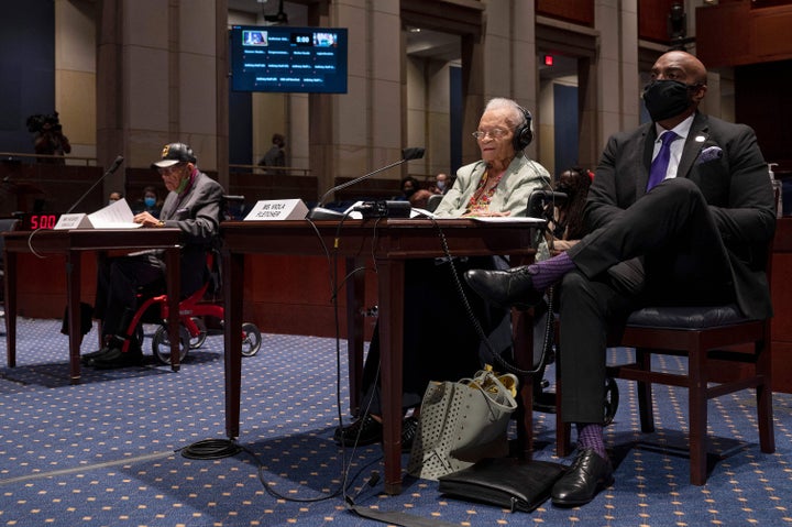 Hughes Van Ellis (left), a World War II veteran, is seen testifying with Viola Fletcher (center), the oldest living survivor of the Tulsa race massacre.