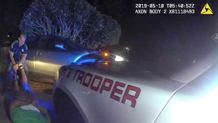 This image from video from Louisiana state police state trooper Dakota DeMoss' body-worn camera, shows trooper Kory York grab