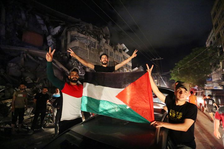 Palestinians take the streets after "mutual and simultaneous" cease-fire deal between Israel and Hamas reached with Egypt mediation took effect at 2 a.m. Friday in Gaza City, Gaza on May 21, 2021.