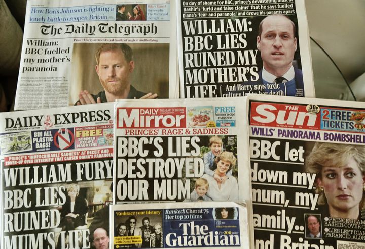 An arrangement of UK daily newspapers from May 21 shows front page headlines reporting Prince William and his brother Prince 