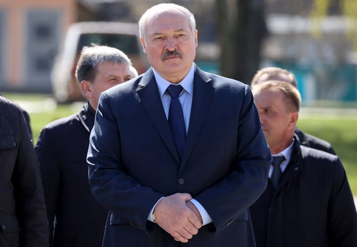 In this Monday April 26, 2021 file photo, Belarus President Alexander Lukashenko, accompanied by officials, attends a requiem