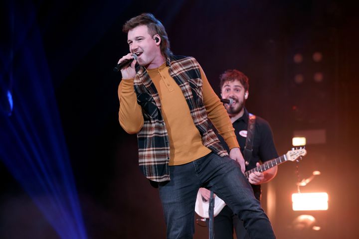 Morgan Wallen won three awards in absentia and the Billboard Music Awards wished him well in what it called his "anti-racist" journey.