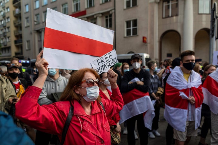 Belarusians living in Poland and Poles supporting them take part in a demonstration Monday in front of European Commission office in Warsaw demanding freedom for Belarus opposition activist Raman Pratasevich a day after a Ryanair flight from Athens to Vilnius was diverted while in Belarusian airspace. 