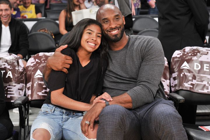 Kobe Bryant and his daughter Gianna Bryant attend a basketball game between the Los Angeles Lakers and the Atlanta Hawks at Staples Center on Nov. 17, 2019, in Los Angeles.