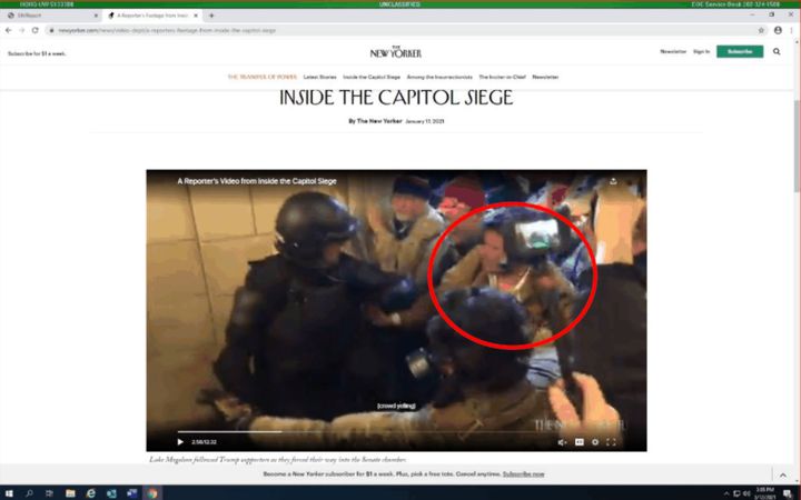 Adam Weibling appears in the red circle in this still from a reporter's video of the Capitol riot, according to an affidavit filed by the FBI.