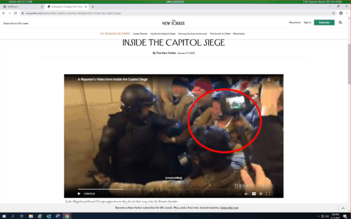 Adam Weibling appears in the red circle in this still from a reporter's video of the Capitol riot, according to an affidavit