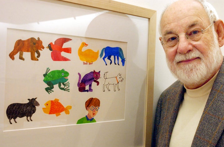 Eric Carle, an illustrator and author of children’s books, with a print of some of his illustrations. Carle died on May
