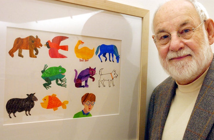 Eric Carle, an illustrator and author of children’s books, with a print of some of his illustrations. Carle died on May 23 at age 91.