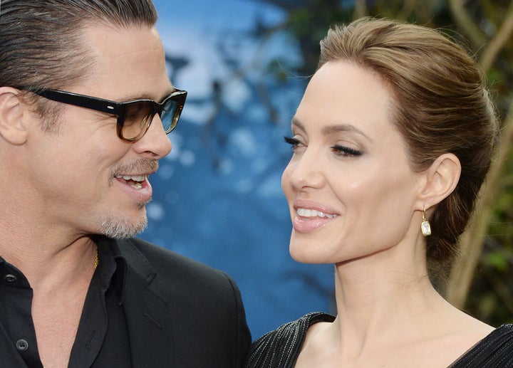 Angelina Jolie y Brad Pitt en Kensington Palace (Londres).