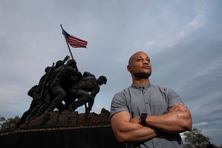 Reserve Marine Maj. Tyrone Collier visits the U.S. Marine Corps War Memorial near his home in Arlington, Va., on Saturday, April 17, 2021. When Collier was a newly minted second lieutenant and judge advocate, he recalls a salute to him from a Black enlisted Marine. But even after Collier acknowledged the gesture, the salute continued. Puzzled, Collier asked why the Marine held it for so long. âHe said, âSir, I just have to come clean with something. ... We never see Black officers. We never see people like you and it makes me extraordinarily proud,ââ Collier recalls. (AP Photo/Cliff Owen)