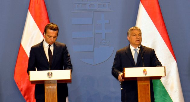 BUDAPEST, HUNGARY - JULY 26: Austrian Chancellor Christian Kern (L) and Hungarian Prime Minister Viktor Orban (R) hold a joint press conference after a meeting concentrated on refugee crisis, at the Delegation Hall of the parliament building in Budapest, Hungary on July 26, 2016. (Photo by Mehmet Yilmaz/Anadolu Agency/Getty Images)