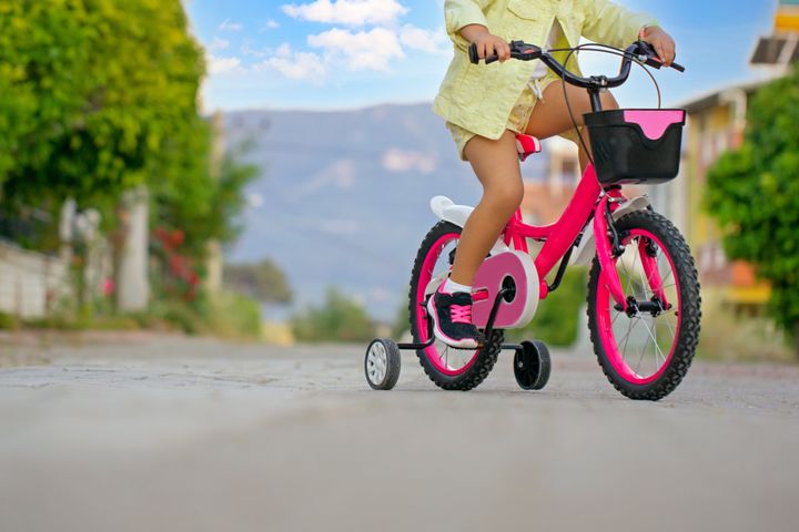 girl foots on the pedal selective focus