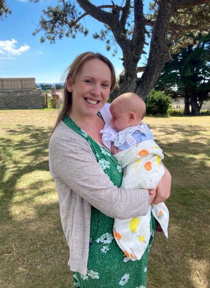 Jessica Girards with her youngest child. 