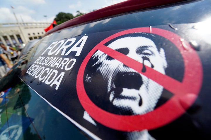 Protesters called for the impeachment of Brazil's far-right President Jair Bolsonaro in February, when the country's COVID-19 crisis was spiraling out of control. Bolsonaro's government has attempted to crack down on critics as his approval ratings have fallen to the lowest point of his presidency.