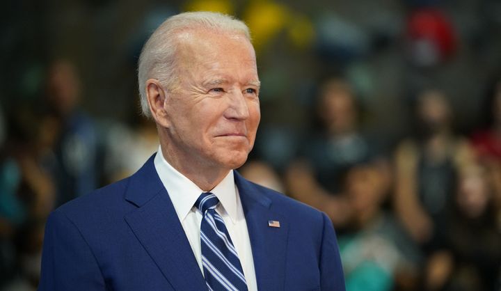 President Joe Biden waits to speak as he visits the Sportrock Climbing Centers in Alexandria, Virginia, on May 28.