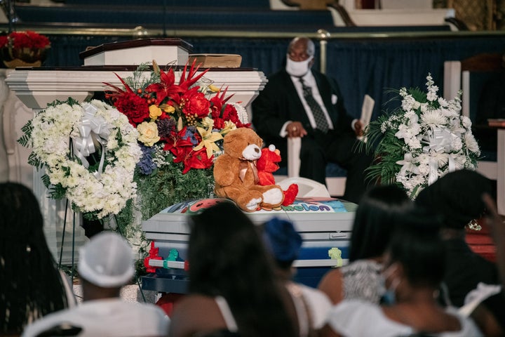 Stuffed toys sit atop the casket of Davell Gardner Jr. at the 1-year-old's funeral on July 27, 2020. Davell's murder embodies