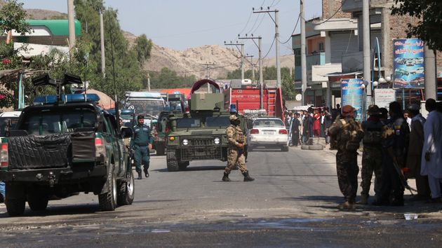 Afghan security force members inspect the site of a bomb explosion in Daman locality of Behsud district, Nangarhar province, Afghanistan on May 27, 2021. Three people, including a district chief, were wounded in an improvised bomb explosion in Afghanistan's eastern province of Nangarhar on Thursday, a local government spokesman confirmed. (Photo by Kawa Basharat/Xinhua via Getty Images)