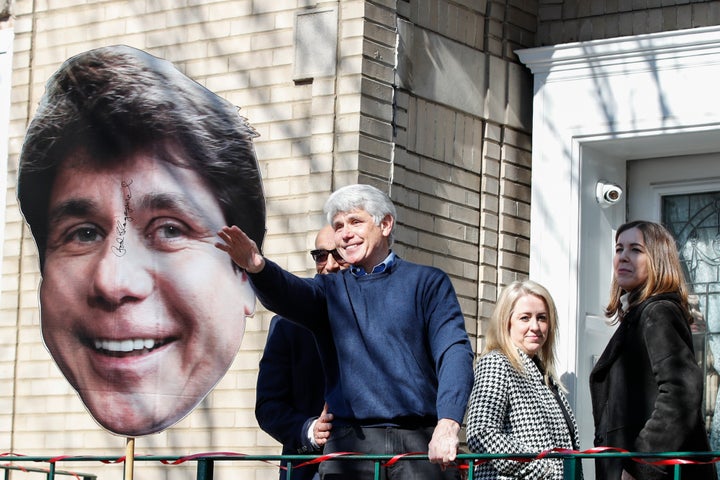 Former Illinois governor Rod Blagojevich waves to supporters outside of his house on February 19, 2020 in Chicago, Illinois. - President Donald Trump on February 18, 2020 commuted the sentence of a former Illinois governor jailed for corruption, as well as pardoning a New York City police chief imprisoned for tax fraud. Pardons were also handed out to Edward DeBartolo Jr, a former owner of the San Francisco 49ers football team, and Michael Milken, a well-known financier dubbed the "junk bond king" who pleaded guilty in 1990 to securities and tax fraud. (Photo by KAMIL KRZACZYNSKI / AFP) (Photo by KAMIL KRZACZYNSKI/AFP via Getty Images)