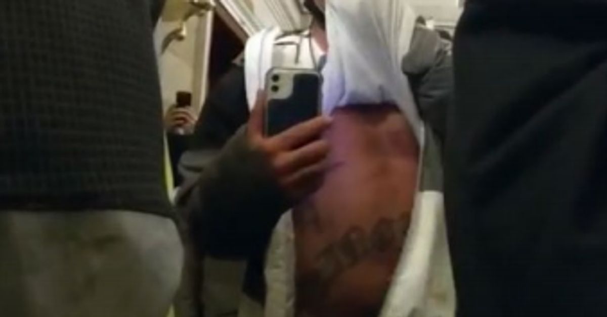 Alleged Capitol Rioter's Massive Stomach Tattoo Aids Arrest