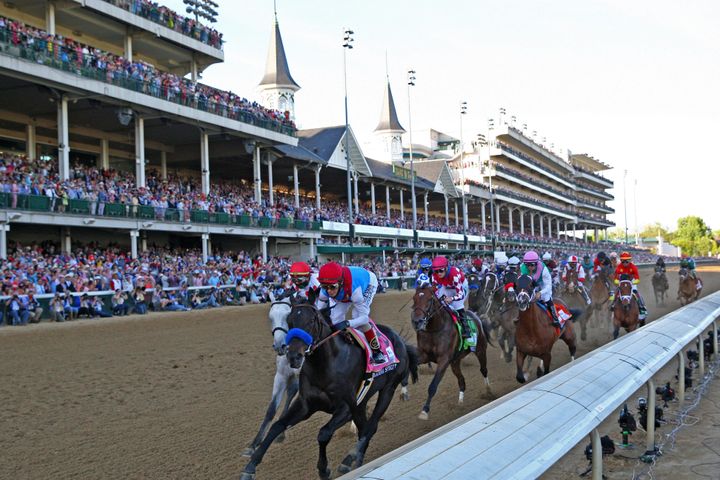 Medina Spirit (8) ridden by jockey John Velazquez leads on the front stretch and goes on to win the 147th Running of the Kentucky Derby on May 1, 2021 at Churchill Downs in Louisville, Kentucky.