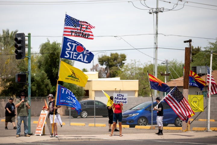 Protestors in support of former President Donald Trump gather outside Veterans Memorial Coliseum in Phoenix, Arizona, on May 1 where Ballots from the 2020 general election wait to be counted as part of an audit.