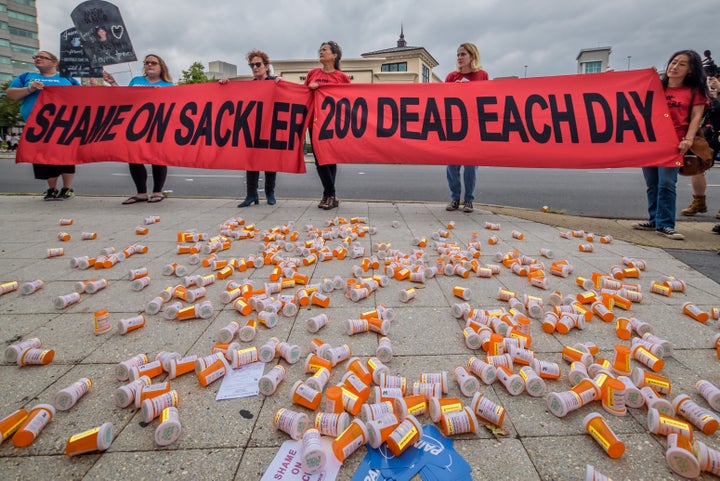 Members of P.A.I.N. (Prescription Addiction Intervention Now) and Truth Pharm staged a protest outside Purdue Pharma headquarters in Stamford, Connecticut, in 2019 over a controversial opioid settlement.