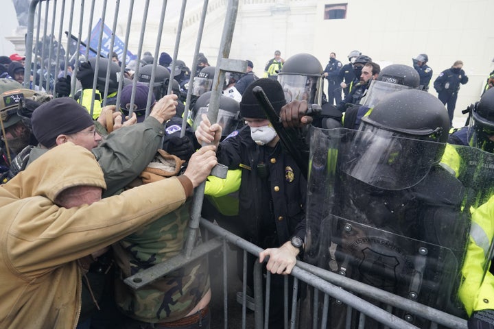 A pro-Trump mob tried to push past police officers to break into the U.S. Capitol. 