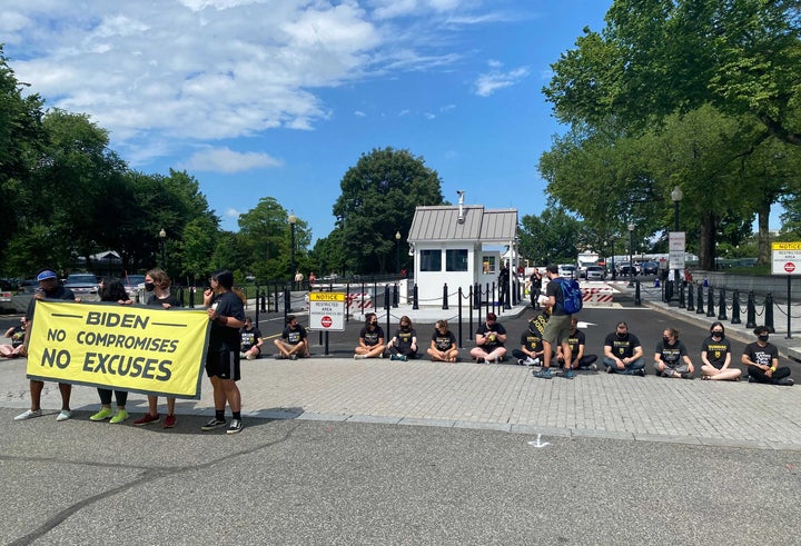 Sunrise Movement protesters blocked the entrance to the White House.