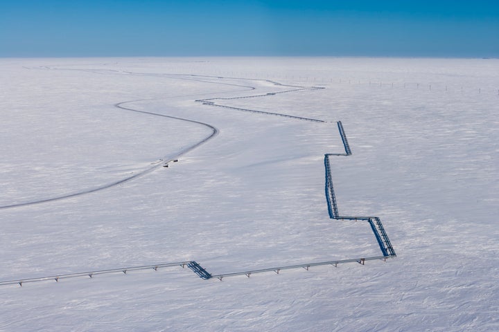 A fossil fuel pipeline near Nuiqsut, Alaska, in the National Petroleum Reserve. 