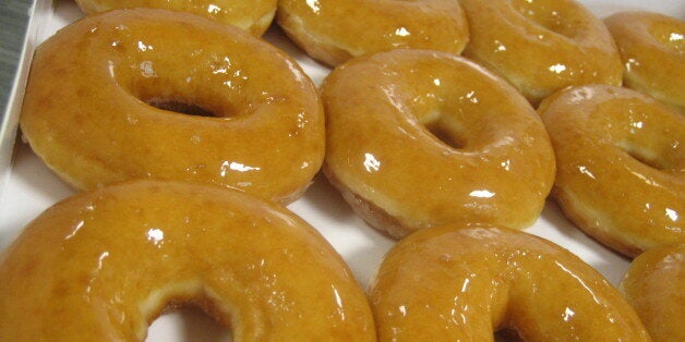 My colleague just came back from HKG, and under my influence and persuasion, she bought a large box (12 donuts) of Krispy Kre