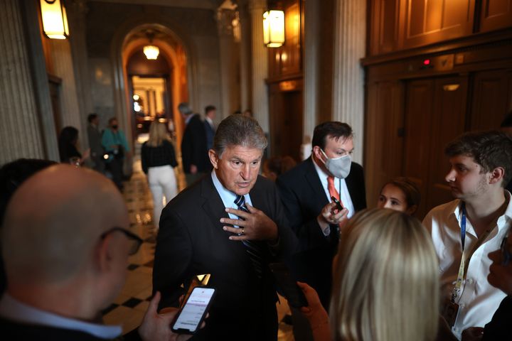 Sen. Joe Manchin (D-WV) talks with reporters after stepping off the Senate Floor at the U.S. Capitol on May 28, 2021 in Washington, DC. 