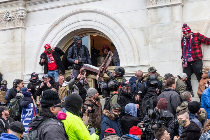 Supporters of former President Donald Trump breach the U.S. Capitol on Jan. 6.