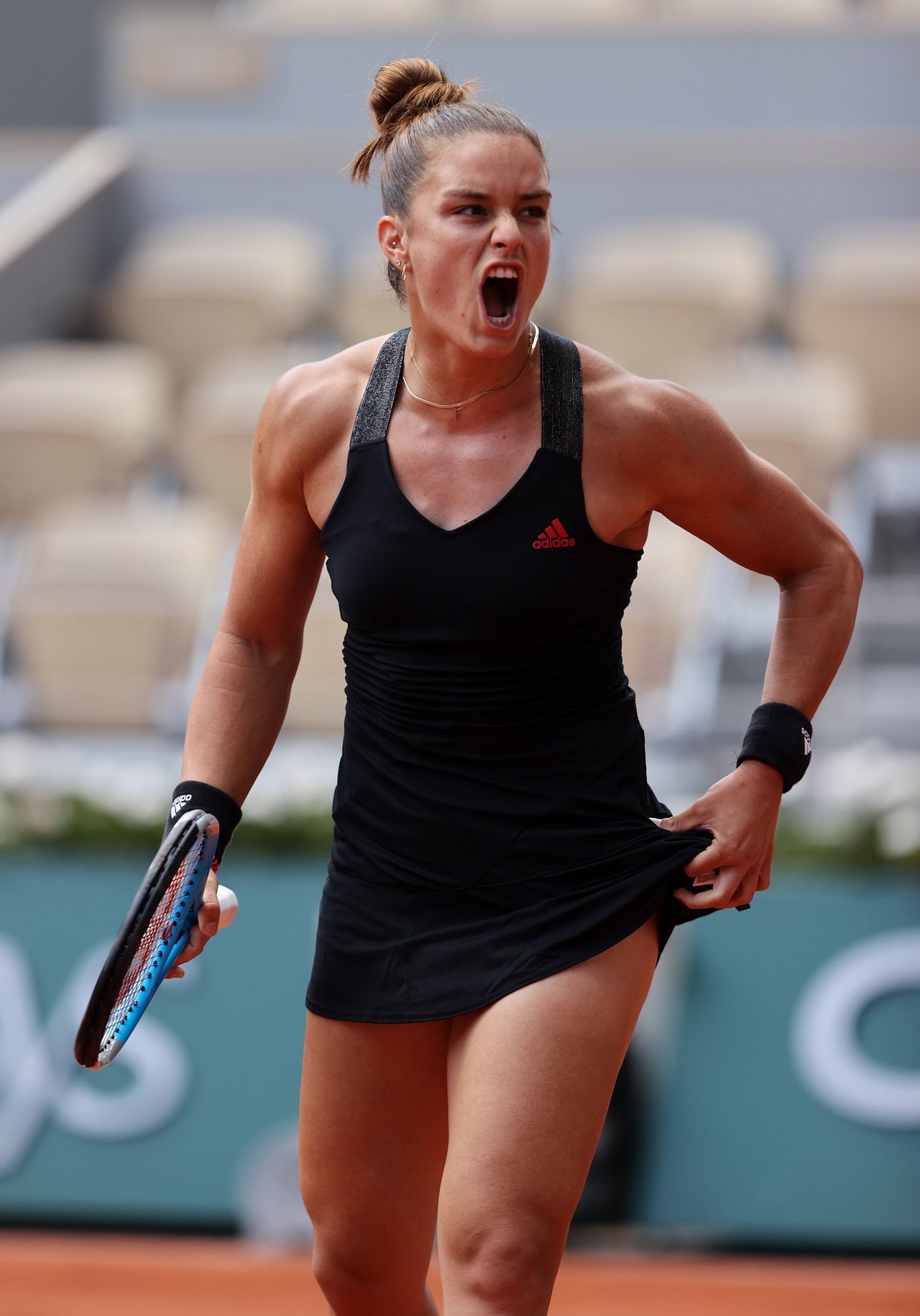 PARIS, FRANCE - JUNE 09: Maria Sakkari of Greece celebrates during her Ladies Singles Quarter-Final match against Iga Swiatek of Poland on Day Eleven of the 2021 French Open at Roland Garros on June 09, 2021 in Paris, France. (Photo by Clive Brunskill/Getty Images)