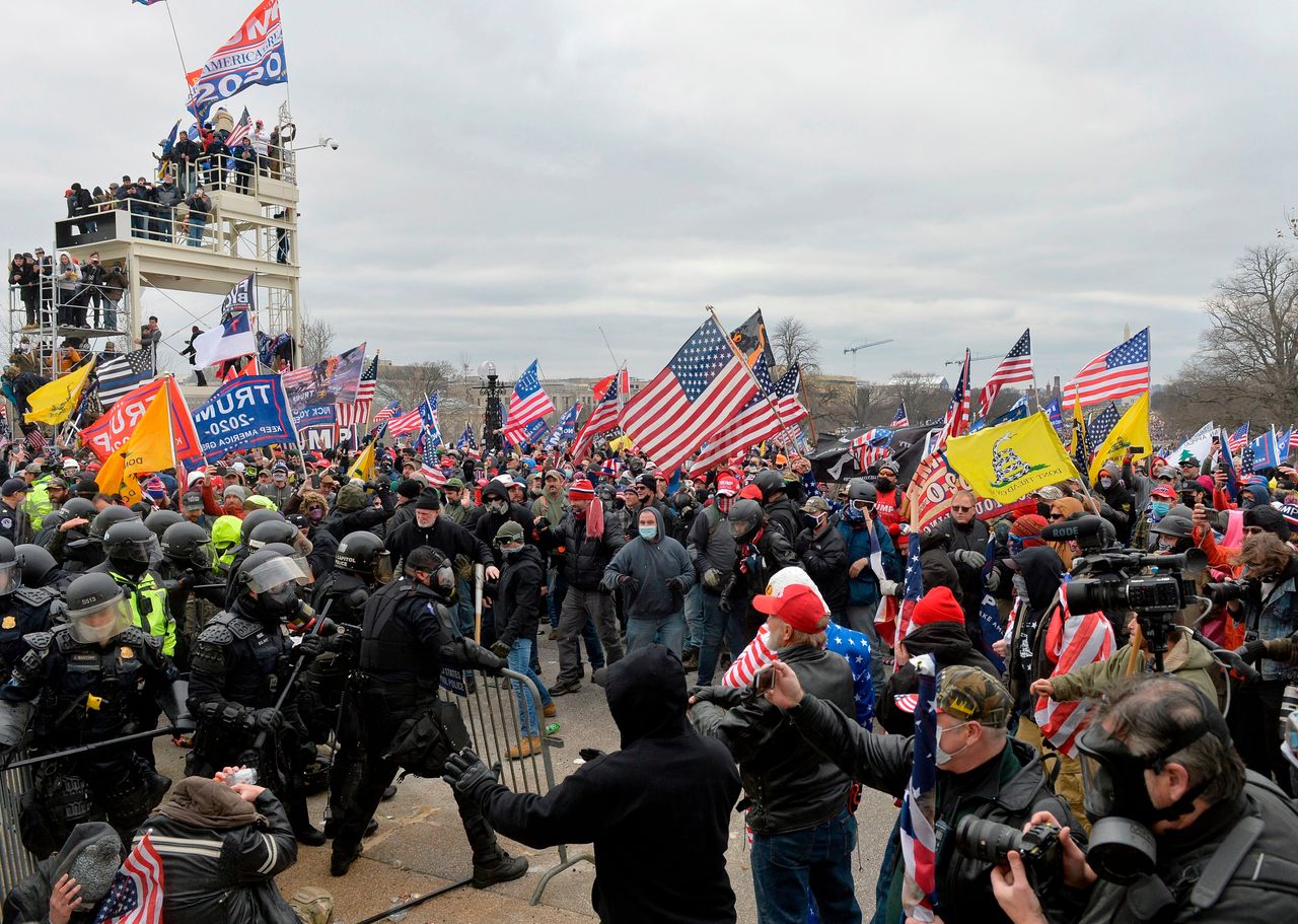 Trump supporters clash with police and security forces as they storm the U.S. Capitol on Jan. 6, 2021.