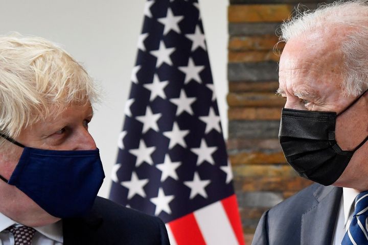 Boris Johnson speaks with US President Joe Biden at the Carbis Bay Hotel, Cornwall