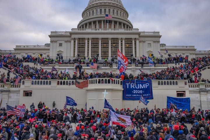 Supporters of then-President Donald Trump stormed the U.S. Capitol building on Jan. 6. Seth Aaron Pendley, who has been charged with plotting to blow up an Amazon data center, claimed to have brought a gun with him.