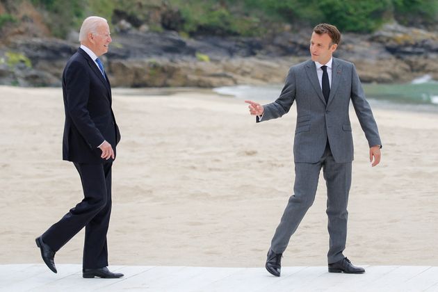 French president Emmanuel Macron (right) greets US president Joe Biden at the G7 summit