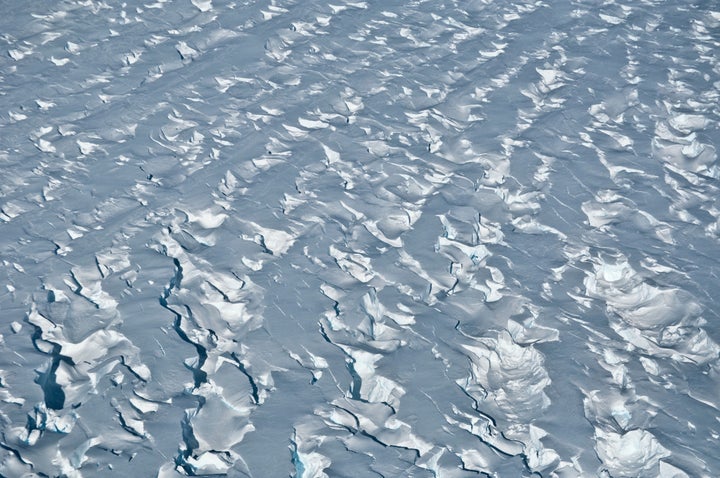 This January 2010 photo shows crevasses near the Pine Island Glacier grounding line, near its western margin in Antarctica. (Ian Joughin via AP)