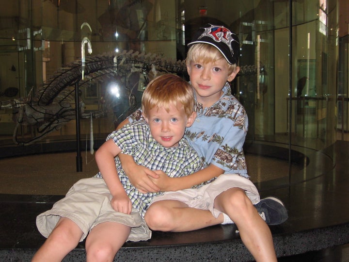 Jonah (right), age 6, looks after his then-3-year old brother, Ian (left), on a trip to the Museum of Natural History in New