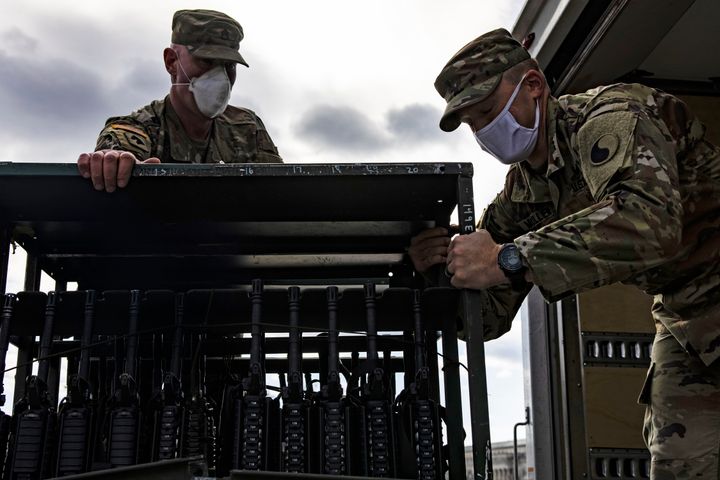 Government records show military pistols, machine guns, shotguns and automatic assault rifles have vanished. National Guard soldiers are seen unloading racks of M4 rifles outside the U.S. Capitol on January 17.