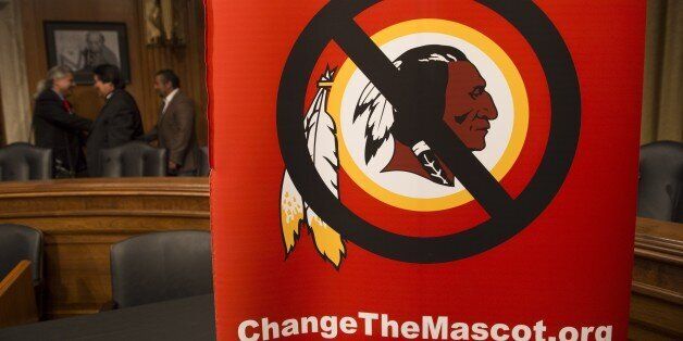 A poster for the 'Change the Mascot' campaign is seen prior to a press conference by the Oneida Indian Nation leaders on Capitol Hill in Washington, DC, September 16, 2014. 'Change the Mascot' is a national campaign to end the use of the racial slur Redskins as the mascot and name of the NFL team in Washington, DC. Launched by the Oneida Indian Nation, the campaign calls upon the NFL and Commissioner Roger Goodell to do the right thing and bring an end the use of the racial epithet. AFP PHOTO / Saul LOEB (Photo credit should read SAUL LOEB/AFP/Getty Images)