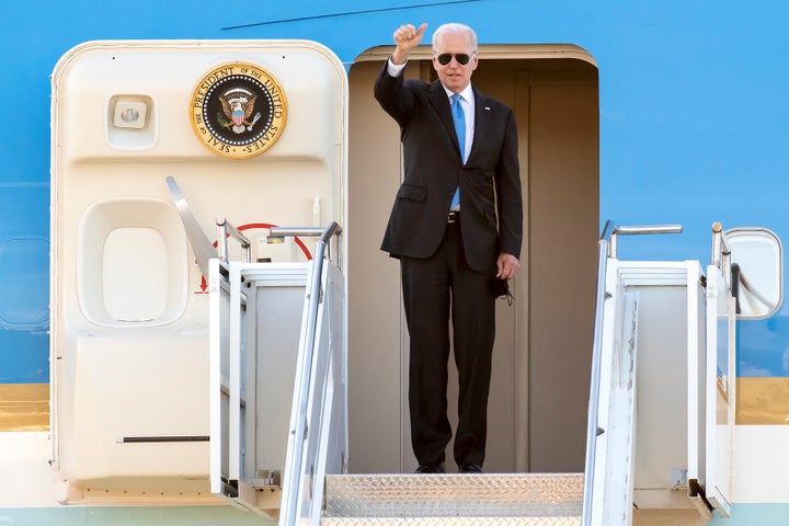 Biden gives a thumbs up before boarding Air Force One after his summit with Putin.