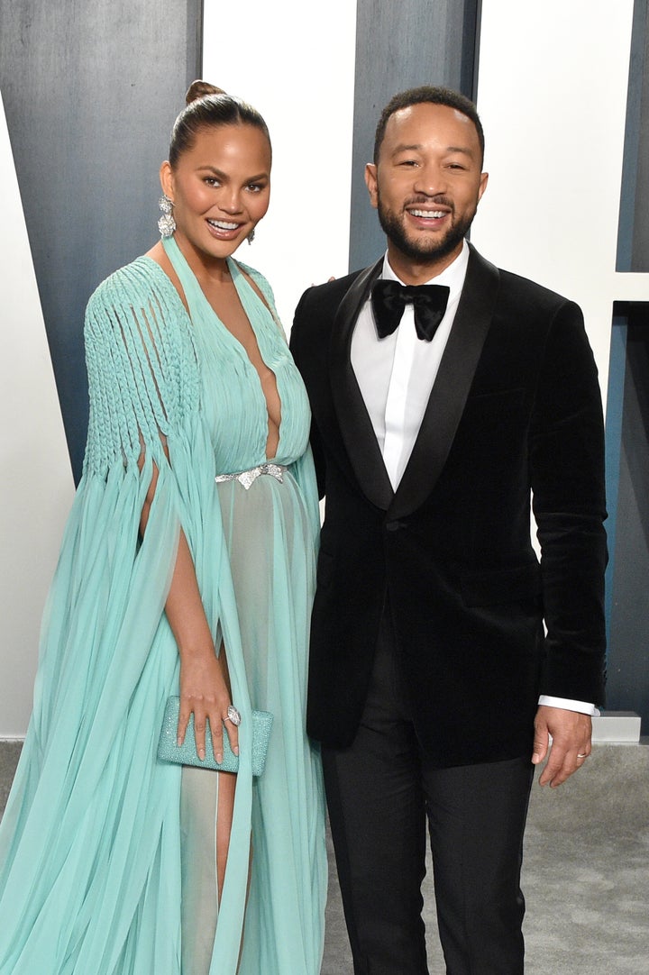 Chrissy Teigen and her husband, John Legend, at the 2020 Vanity Fair Oscar Party.