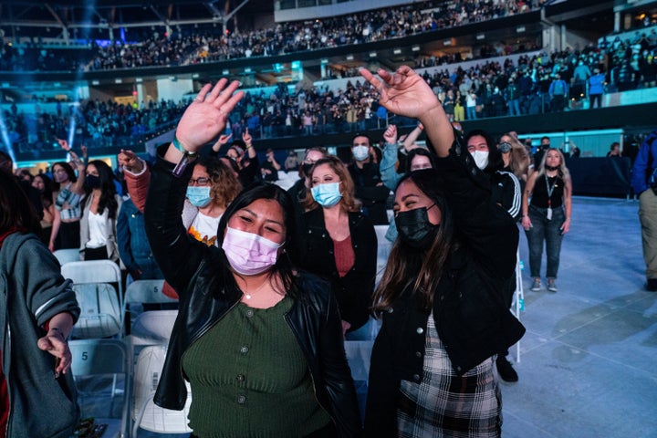 Fans enjoy The Foo Fighters performance at the Vax Live concert.