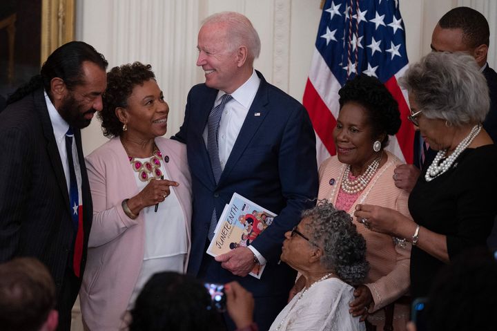 President Joe Biden speaks with Opal Lee (lower right) and guests after he signed the Juneteenth National Independence Day Act on June 17 in Washington. 