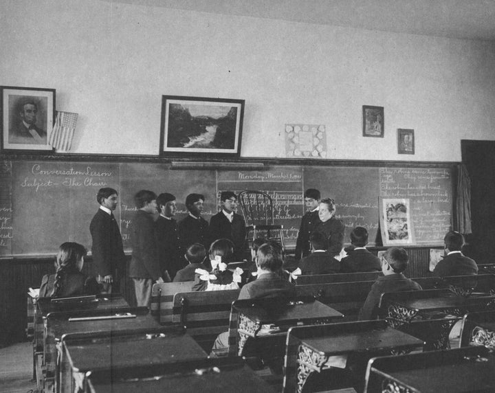 Boys are seen at the Indian Industrial School, which shut down in 1918. The remains of 10 Native American children who died at the school and were buried there will be returned to their relatives, authorities said.